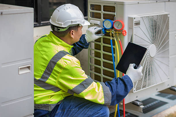 Professional Hvac technician working in Melville, NY